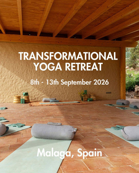 Yoga retreat setup with mats and props in a wooden building in Malaga, Spain.